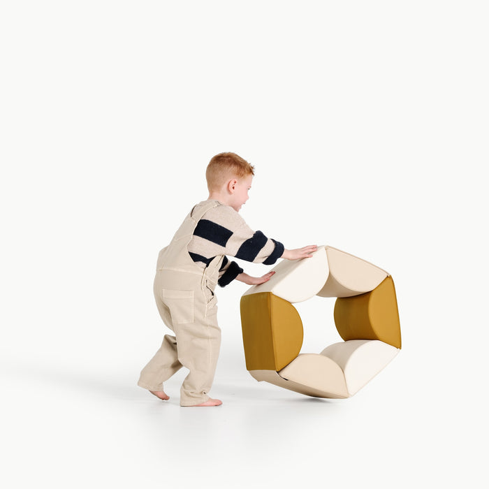 Ivory • Millet • Saffron@little boy playing with the hex hopper